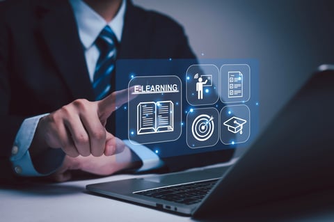 Adult engaged in online learning and education at home, self-paced study on laptop